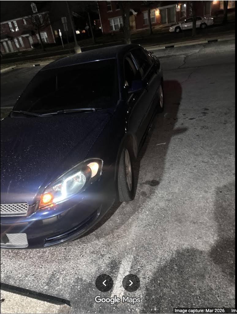 Client vehicle — side angle showing tint darkness